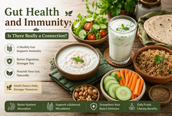 Flat lay of gut-friendly foods including curd, buttermilk (chaas), fresh vegetables, whole grains, fruits, and nuts arranged on a rustic wooden table in natural daylight, illustrating the relationship between gut health and immunity through everyday nutrition.