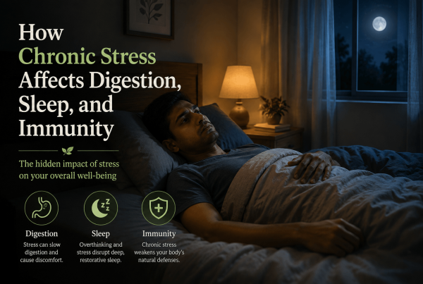 Person lying awake in bed at night with a hand resting on the stomach, illustrating the effects of chronic stress on digestion, sleep, and immunity.
